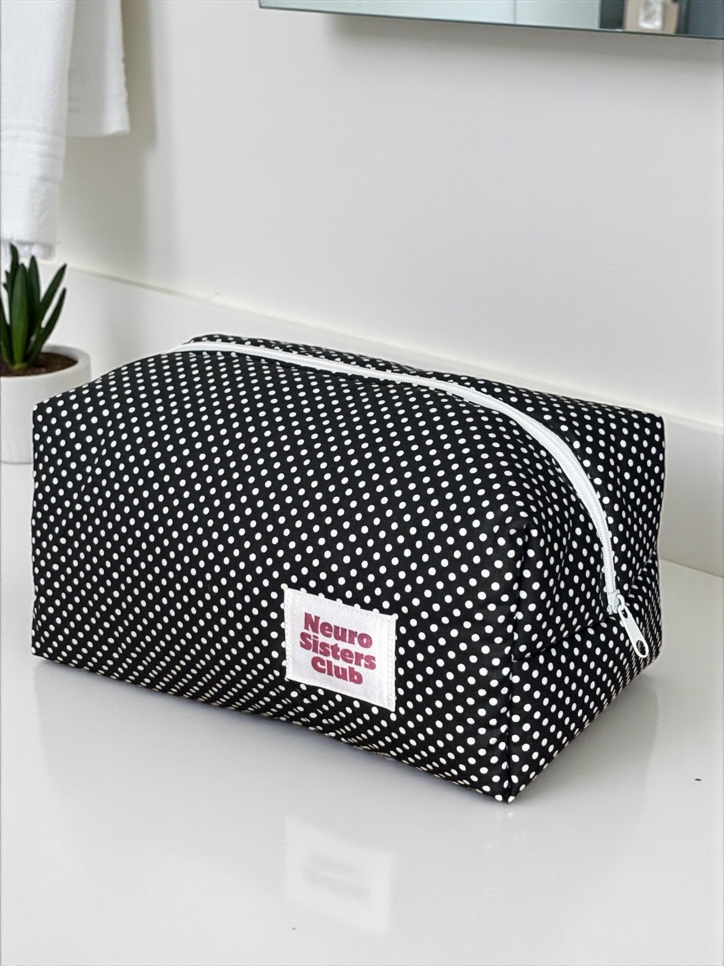 Trousse de toilette noir à pois