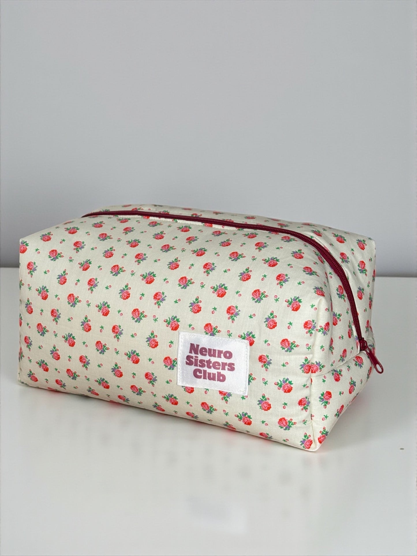 Trousse de toilette à fleur rouge