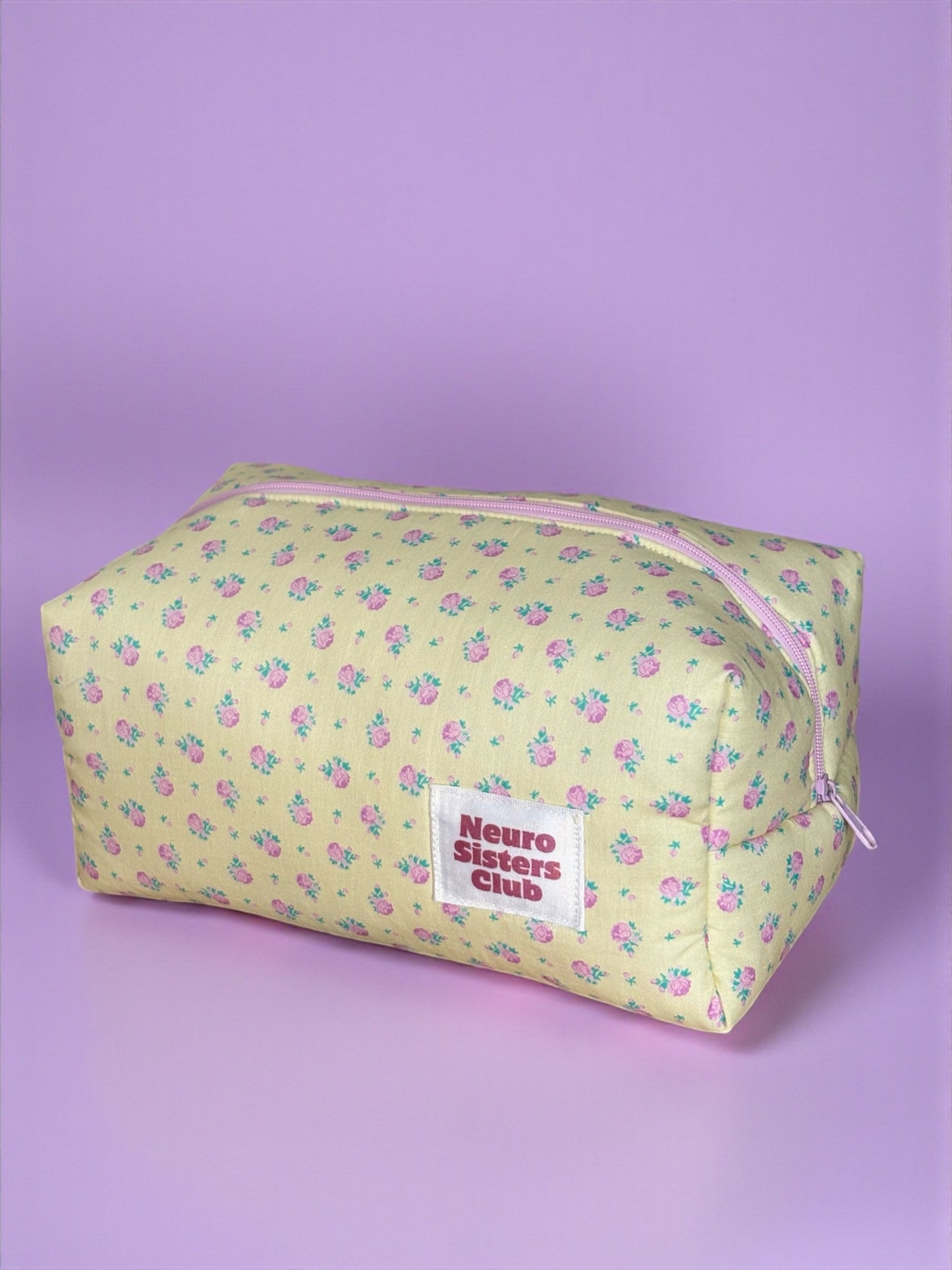 Trousse de toilette à fleur lilas