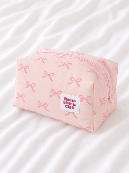 Trousse de toilette rose à noeud